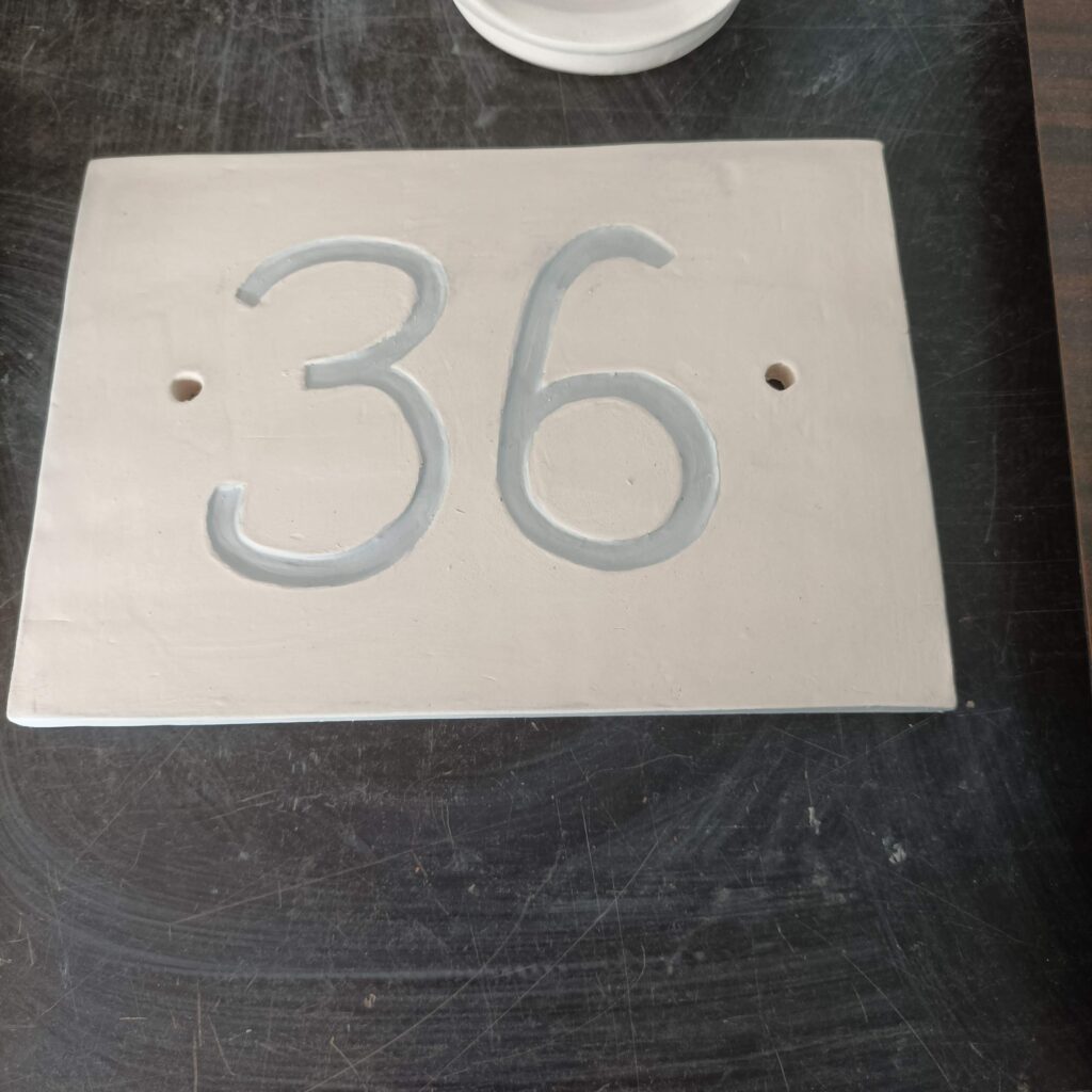 Création de votre numéro de plaque de rue en plaque céramique